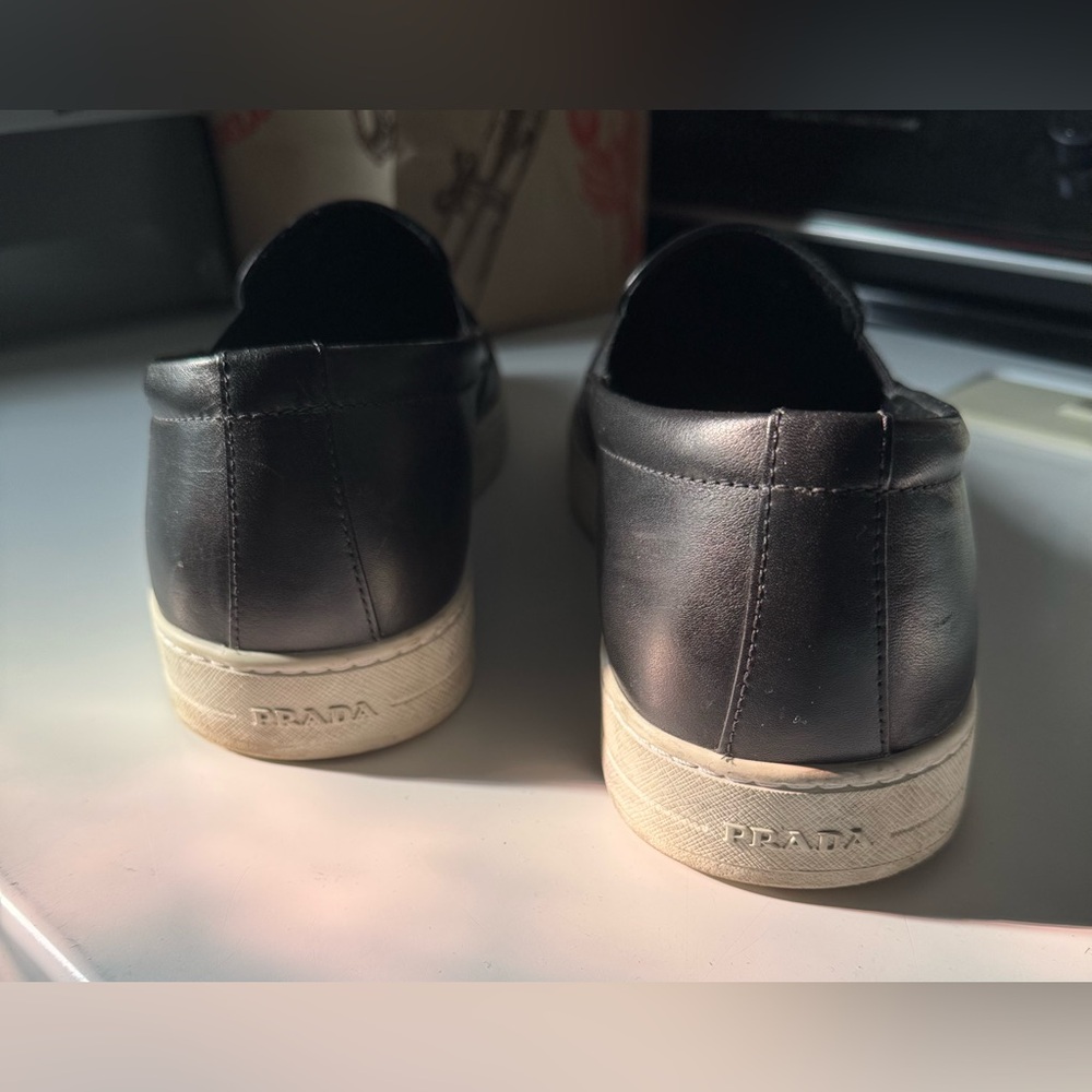 Prada Men's Black Slip-On Loafers..
Fit large I’m 10.5 - 11 and fit perfectly. - Picture 8 of 8